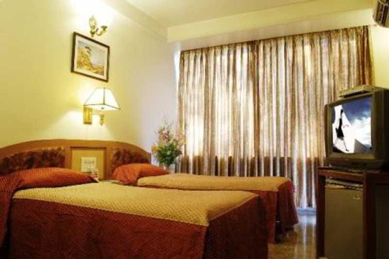 Hotel Mandakini Ambience Pune Rum bild